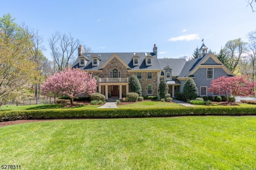 Beautifully updated with a variety of recent renovations and design details, a custom country home is an inviting presence on over five rolling acres on the Bernardsville Mountain. Finished in wood shingles and stone, the timeless facade is accentuated by brick chimneys. Outdoor spaces such as a refreshing oval pool, open and covered terraces, porches and decks take advantage of the gorgeous countryside. Inside, four finished levels present well-designed living space. Six bedroom suites ( one on the first floor), a walkout finished lower level and four-car garage are highlights of the sun-filled floor plan. Prevailing features include one wood-burning and four gas fireplaces, deep carved baseboards, stacked crown moldings and flooring of oak and limestone. The current owners made numerous major upgrades inside and out, including a new roof and new solar in 2023, refinished floors and staircases, and a 2022 basement kitchenette updates. Amazing details inside and out - ideal for multi-generational living!