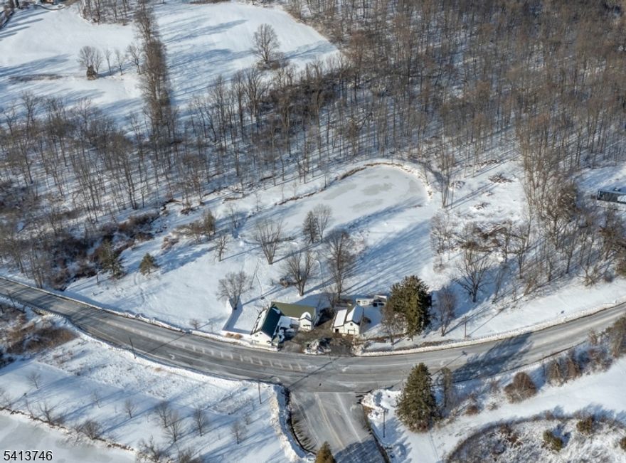 A rare opportunity to own two homes on 9.22 pastoral acres. A gorgeous pond provides a view and the opportunity to fish. The property is presently used as an income property and also offers the versatility of a MOTHER/DAUGHTER with two separate residences. The charming main house dates from circa 1835. The smaller home is a legal rental with most living space on the second floor. A rear deck overlooks the pond and fenced backyard. This has horse property potential. Amenities include abundant storage in the large barn outbuildings and garages with opener for overflow. A 5 bedroom septic system was installed in 2022. Both homes have modern kitchens and baths. There may be the possibility for Farmland Assessment. The versatile main house offers walk-out ground floor living space, two full baths as well as first and second floor levels of living space. It is set privately on the eastern portion of the land with a 2 car garage. Barn buildings are adjacent to the smaller two story tenant APT which has a privacy fenced yard for pets and a large garage. The barns provide a buffer between the two homes. There is plenty of parking available.