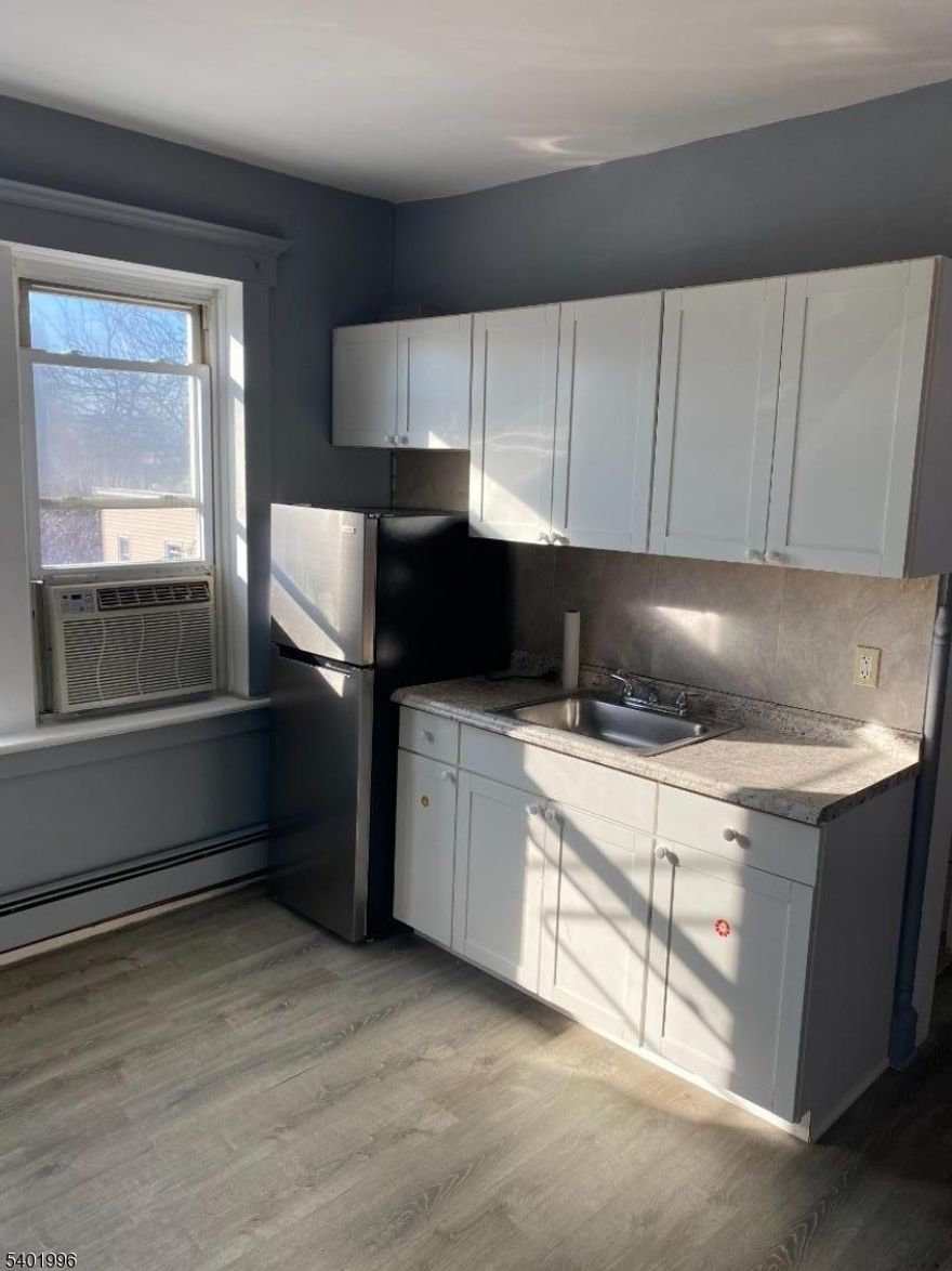 Freshly renovated 1-bedroom, 1-bath apartment in Passaic. Features a modern kitchen and bath, spacious bedrooms, and updated finishes throughout. The building offers coin-operated washer/dryer for added convenience. Great location close to shopping, dining, schools, and public transportation.