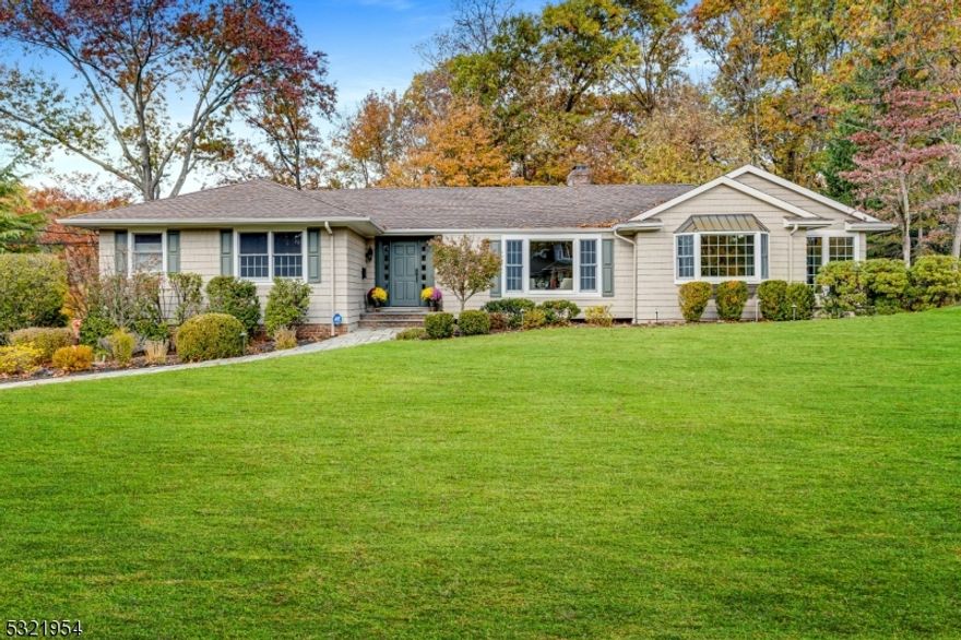 Welcome Home to this sprawling 4 bedroom, 3 bath ranch on a gorgeous .44 acre lot in Westfield's highly desirable Indian Forest neighborhood! Beyond the loads of curb appeal you are welcomed by elegance and class. Entry foyer leads to sun drenched living room, formal dining room and show stopping eat in kitchen with large island, Viking stove, pantry, granite counter tops and custom cabinetry. Curl up in front of the fire in the super spacious family room with views of the park-like back yard. Enjoy working from home in the private office/sunroom surrounded by tons of natural light. Down the hall you will find 3 large bedrooms including master retreat with dressing room and spa like bath! Ground level is fully finished offering huge rec room with fireplace and plenty of space for large sectional and pool table making for a fantastic entertaining space. Private bedroom with walk in closet, gorgeous full bath and spacious laundry room complete the ground level. Rear yard is truly spectacular featuring elevated deck and tons of grassy space. The mature trees and professional lighting create an outdoor oasis. Multi-zone HVAC, gorgeous lighting, freshly painted interior, new flooring, sprinkler system and whole house generator. This home has been impeccably maintained inside and out. Fantastic Indian Forest location off Lawrence Avenue and near Franklin School! Convenient to train, bus and Westfield's amazing downtown!