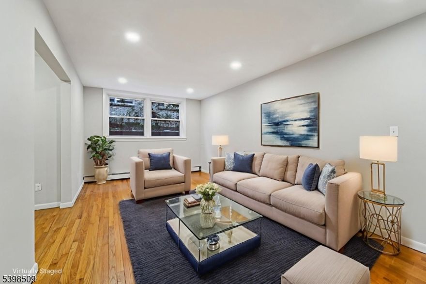 Spacious one bedroom apartment available for immediate occupancy, featuring a sunlit eat-in kitchen with a brand-new white cabinetry design and stainless steel appliances, including refrigerator, microwave, dishwasher, and range. The unit offers hardwood floors throughout, a newly updated on-trend bathroom, and a convenient mudroom entry. Heat, cooking gas, and water are included. Laundry facilities are located in the building, and off-street parking is available. Ideally situated near Bloomfield College and within walking distance to bus service and the PATH station, making commuting easy. Don't miss this opportunity to rent a spacious, well-appointed home in a prime location.