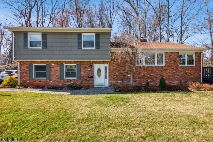 Nestled in a prime location in the heart of Florham Park, this beautifully finished & meticulously maintained home offers the perfect blend of comfort, style & convenience. Featuring 3 generously sized bedrooms & 2.1 bathrooms, this home is designed for modern living with an open-concept flow between the kitchen, dining & living areas - highlighted by a stunning 2-sided brick fireplace. The renovated eat-in kitchen is a chef's dream, boasting quartz counters, SS appliances & expansive storage. Plus, the kitchen is open to the formal dining & living rooms, and features access to the expansive wrap-around deck. Upstairs, the luxurious primary suite provides a private retreat with a renovated ensuite bath, while downstairs the cozy family room with a gas fireplace is perfect for relaxation. Finally, a large basement rec room/gym adds valuable extra space for work or play. Step outside from either the kitchen or family room to venture onto the 800+ sqft wrap-around deck, an entertainer's paradise overlooking the level 0.37-acre lot. For added convenience, the attached 1-car garage offers easy ground floor access. Located just minutes from downtown Florham Park & Madison, this home is nearby to premier shopping, dining, parks & schools. With easy access to major highways & the Madison Train Station with direct service to NYC, commuting is a breeze. Situated in one of Florham Park's most desired neighborhoods, 11 Insley Rd is truly a rare find waiting for a new owner to call home!