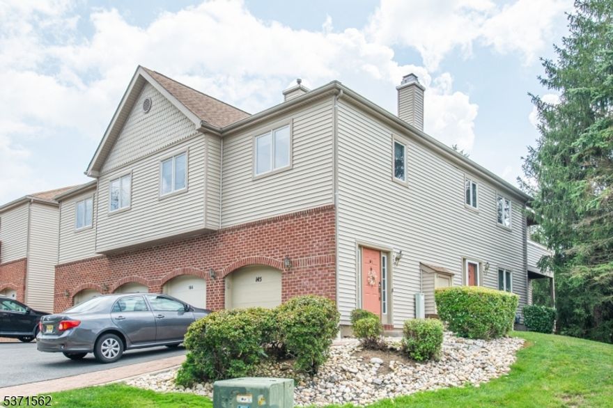 Beautifully cared for FIRST floor condo in central location to all life's conveniences. Open, bright living space! Kitchen area offers eating area and tons of cabinet/counter space. Spacious primary suite with walk-in closet and en-suite with tub & stall shower. Generous sized 2nd bedroom & 2nd full bath. Laundry room with washer & dryer. Bonus attic space & 1 car garage with direct access. Situated in quiet community with clubhouse, pool and tennis courts. Conveniently located near major highways, mass transit and shopping. Move In Now!