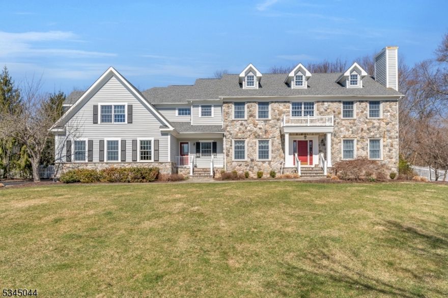 Welcome home to a classic 5 Bedroom, 4.5 Bath center hall Colonial that has been beautifully maintained and upgraded by the original owners over the last 27 years. A large two-story foyer greets you as you enter this spacious home. The formal living room has a fireplace and French doors to a formal office. The formal dining room w/tray ceiling also opens to the gourmet kitchen. A step-down two-story family room with another charming fireplace and a wall of windows overlooks the private, fenced rear yard. The chef's kitchen features a large center island, custom decorative artistic tiling and a separate breakfast room with more walls of windows and sliders leading to a new Trex composite all weather deck. Also on the main level is a large laundry room, powder room, side entry, study with bow windows, screen porch, and a three-car garage w/ direct access to the 2nd basement stairs. On the second level you will find a large master suite with 2 walk-in closets and a sumptuous master bath with soaking tub and walk-in shower.  There are 4 additional bedrooms and 2 more full bathrooms.  In the finished basement you will find wainscoting, another full bath, a recreation room, an exercise room, a cedar closet, a wine closet, and a large storage/utility room with tons of shelves. Other features include 2 zone heating (1st floor new/1 year HVAC), alarm system, gutter shields, sliding screens on all doors, fully fenced rear yard, whole house generator, sprinklers, and a backyard gazebo.