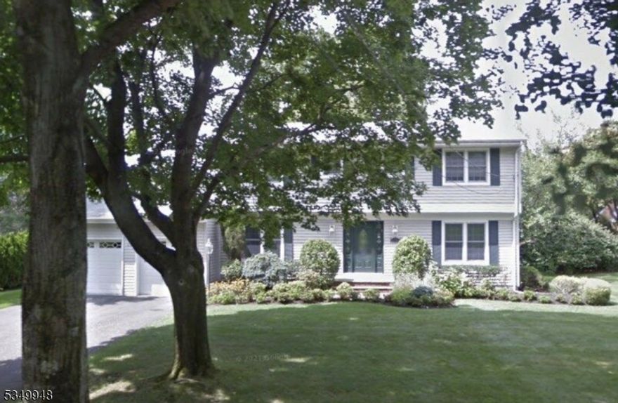 Bright, open and elegant colonial nestled on lushly landscaped level lot in desirable Preakness Hills.  This original owner home has been meticulously maintained and features open concept with enormous updated gourmet Chef's kitchen w/professional grade appliances, center island, pantry, dbl ovens & sinks, updated powder room and main level laundry room.  The kitchen is open to a rotunda style breakfast room w/sliders to large deck, perfect for entertaining; & completely open to warm FR w/built in entertainment center--perfect for quiet evenings or entertaining.  The deck looks out over the large level grounds.  The upper level features 3 generous sized bedrooms with ample closet space, an newer main bath & primary suite offering two room bath, vanity station, dressing area and walk in closet--a sanctuary for unwinding.  The LL features rec room area, exercise room, office & full bath,  This impressive home has so much to offer. Located close to schools, shopping, major highways, NYC transportation and more.