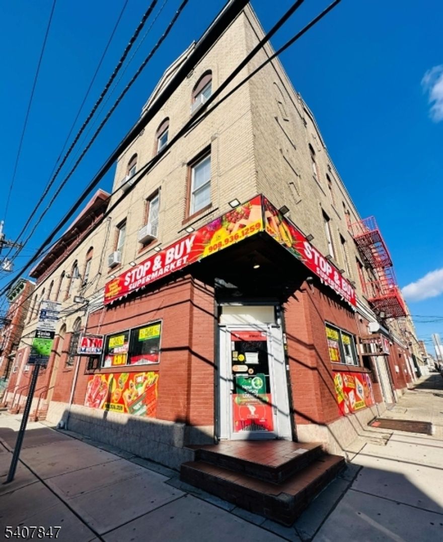 Attention West New York Community! An outstanding investment opportunity is now available at 5901-5907 Madison Street. Ideally located just one block from Bergenline Avenue and a public parking lot, this property features nine two-bedroom apartments and a fully equipped 3,000 sq ft supermarket. All tenants, including the commercial unit, are responsible for their own utilities, including heating and hot water.