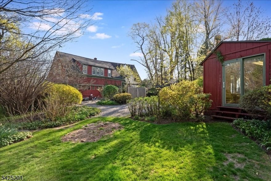 74 Porter Place: Berkshires Living in Montclair, Where Suburb Meets the City! Some properties defy easy description. This is one of them. Set on nearly a full, flat acre in Montclair's coveted Estate Section, this is a once-in-a-generation offering: a romantic, fully renovated cottage paired with a separate two-room office/artist's studio, surrounded by breathtaking private gardens. The kind of place that makes you forget you're twenty minutes from Manhattan.Perfect for upsizers seeking room to grow, downsizers craving turnkey ease, artists needing a light-filled studio, or city dwellers longing for a country retreat without leaving the vibrant, cultural lifestyle Montclair offers. Every inch has been thoughtfully updated; renovations include refinished hardwood floors, fresh paint, new light fixtures, and much more. Sun-soaked sliding doors open to a Jansen heated gunite pool.The soul of the property lies in its grounds. Nearly 1 acre of level, lovingly cultivated land, once tended by a gardener who recreated the Irish country gardens of her childhood. Mature trees and seasonal blooms have earned repeated features on Van Vleck's Roses to Rocks garden tour.On top of it all, the open front lot offers rare possibility: build your dream home (variance required) or preserve the gardens as a private sanctuary, all moments from downtown's restaurants, boutiques, and theatres.74 Porter is an invitation to slow down, to create, and to grow something beautiful.