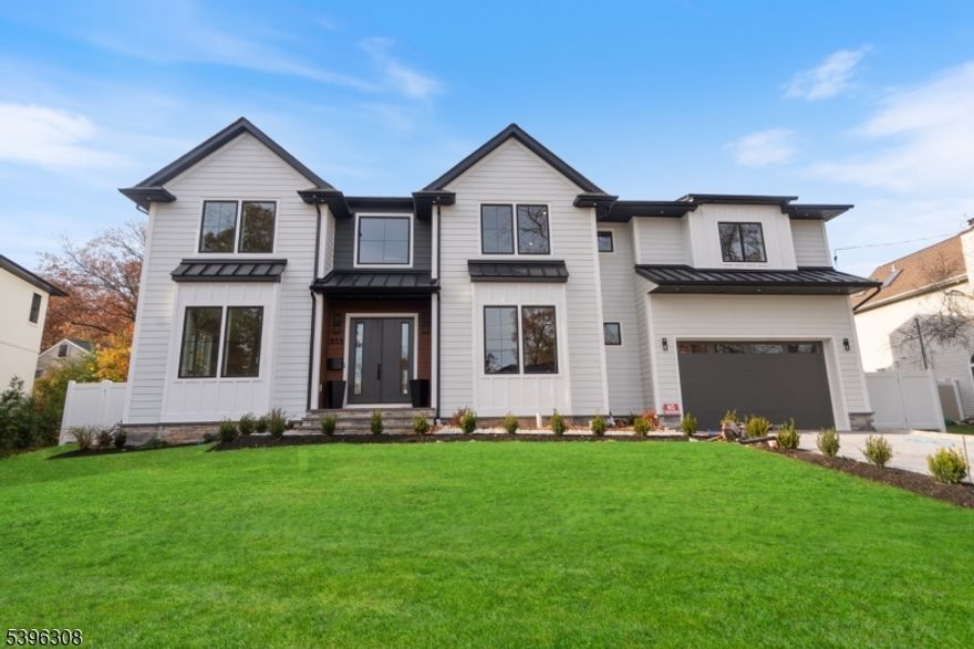 Stunningly luxurious new construction in the low-tax town of Paramus, offering 7,400+ total sq ft on an oversized lot, blending elegant design with top-tier functionality. Features include 10-foot ceilings, custom trim work, and herringbone flooring in the two-story foyer. The main level features a first-floor bedroom suite with ADA-compliant full bath, half bath, office, and formal dining room with wet bar, chef's kitchen with Viking appliances, custom cabinetry, breakfast nook, and a layout that opens to a spacious backyard (with room for a pool). Upstairs, the primary suite includes 2 custom walk-in closets and a private balcony. 4 additional bedrooms  2 with en-suite bathrooms, a full bath, and a laundry room. Enjoy upscale finishes throughout, including heated floors, floating vanities, and white oak hardwood flooring on both levels. The home is prewired as a full smart home, with hookups for exterior cameras, alarm systems, and customizable automation. Gym, or a movie theater. Wine room, great room with wet bar, and 2 additional bedrooms with full bath.