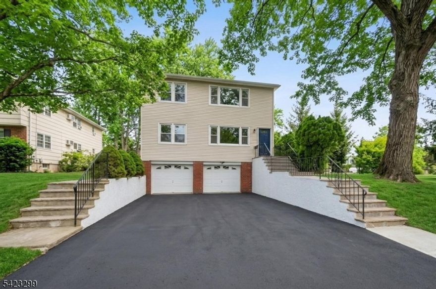 A rare opportunity to own a beautifully maintained two-unit home in one of New Jersey's most sought-after communities. Whether you're an investor seeking strong rental returns or a savvy buyer looking to live in one unit while offsetting your mortgage, this property delivers on every front. Each spacious unit features 3 bedrooms, 1 full bath, and 1 half bath, gleaming hardwood floors, and abundant natural light throughout. Private entrances for each unit provide true separation and privacy; ideal for owner-occupants and tenants alike. The full basement houses separate utilities and washer/dryer, making day-to-day management simple and efficient. Outside, enjoy a stunning backyard retreat complete with a patio, perfect for entertaining or simply unwinding. A two-car garage rounds out this incredibly functional property. Located just steps from downtown New Providence, NJ Transit, top-rated restaurants, and shops, this home sits within the award-winning New Providence School District. Well-maintained and move-in ready, opportunities like this don't last long!