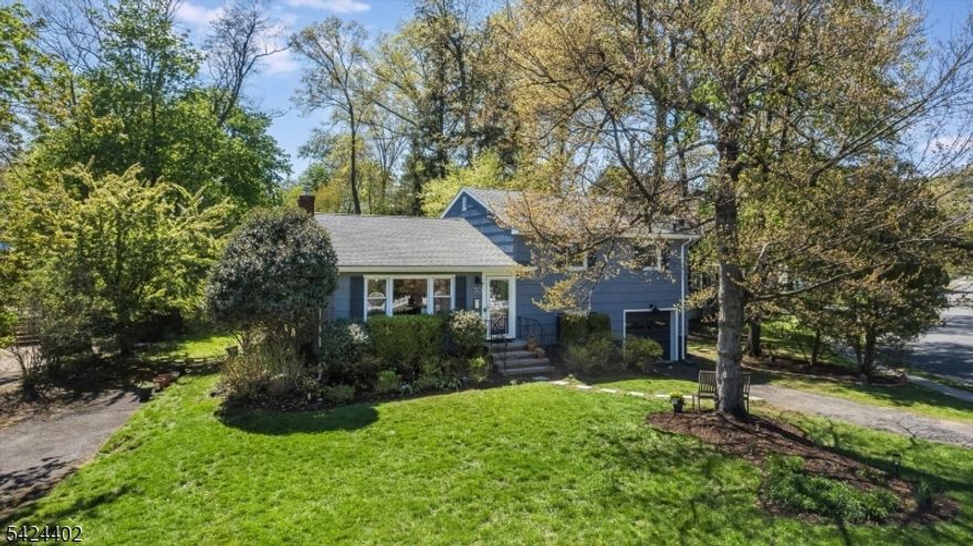 Where Style Meets Soul--welcome to this light-filled, eclectic 3-bedroom, 1.5-bath home sits on a truly rare piece of Montclair real estate, over half an acre on one of the town's most beautiful streets, opening up possibilities that most Montclair buyers never get to dream about. The main level features an open, airy layout with just the right amount of separation. A well-appointed kitchen with stainless steel appliances flows onto a large deck, setting the stage for effortless indoor-outdoor living. Three well-proportioned bedrooms with hardwood floors and a modern updated full bath complete a space that adapts beautifully to how you actually live. The finished lower level offers a den, office nook, and an adorable half bath, with direct access to the extraordinary backyard. Beyond the finished lower level, a separate utility area houses the laundry and offers generous additional storage   whether you envision a rec room, home gym, or creative studio, the bones are there. The lot has the scale for a pool or accessory dwelling unit, a fire pit ready for gathering, and a dual driveway out front for effortless parking. A fully organic garden blooms with herbs, wildflowers, and native plants each season. All this, plus low taxes and a location that places you alongside the sought-after Erwin Park neighborhood and close to Edgemont Park, Watchung Plaza, Walnut Street train access, weekend farmers markets, cafes, and yoga studios. Photos coming soon!