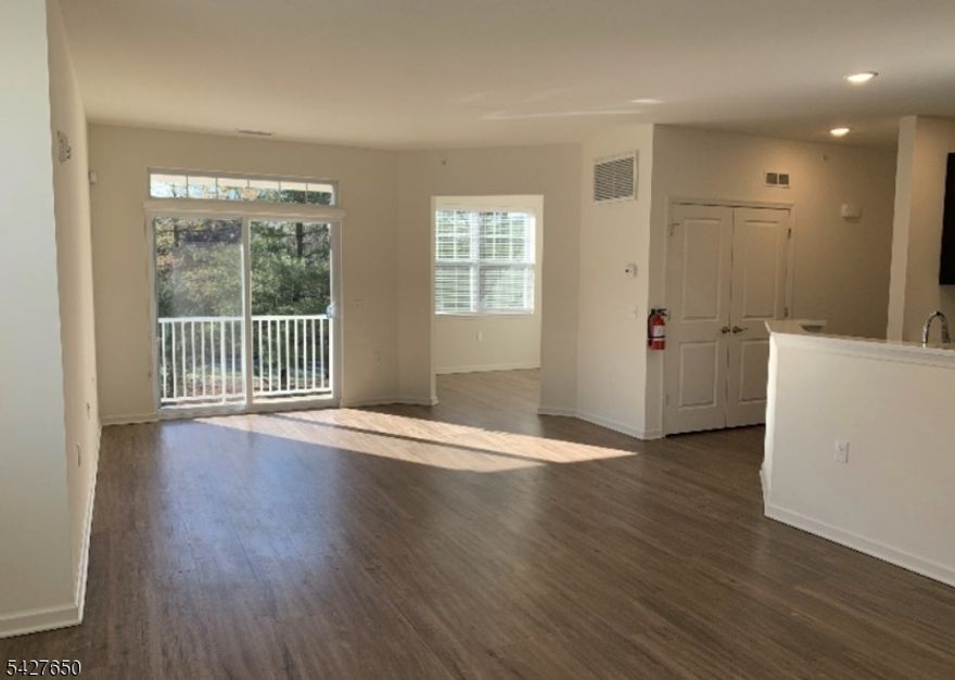 Magnolia Lane rental two bedroom with study. Open concept floor plan with modern finishes. Two full baths, garage, private entrance, plenty of parking & laundry in unit! Easy access to all major highways, shopping, dining & NYC transit.