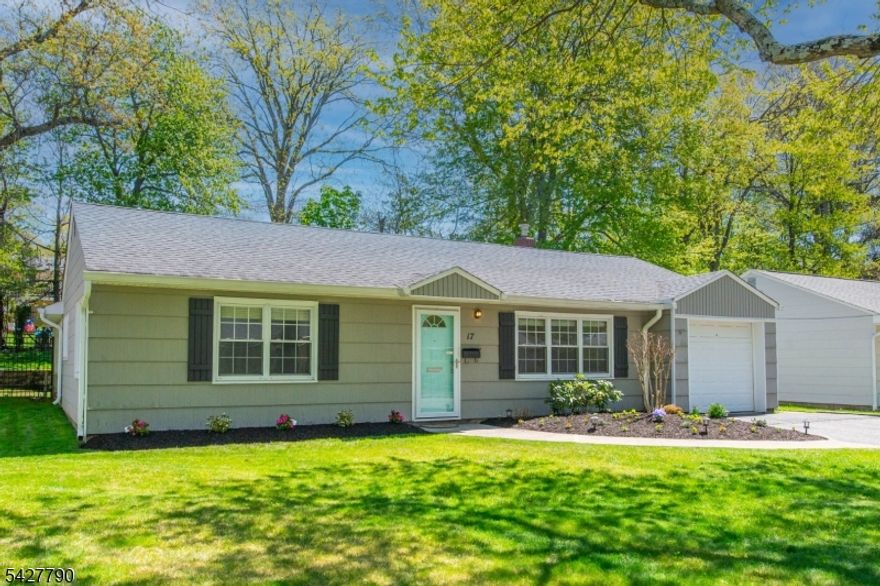 Beautiful CURB APPEAL on a quiet, tree-lined street! Boasting 3 spacious no-step bedrooms and 2 full baths, this home is thoughtfully designed for effortless ONE-LEVEL living. Enjoy an easy-flow layout from the UPDATED kitchen into a warm and inviting Living/Dining Room complete with a wood-burning fireplace and direct walk-out access to the PATIO and PLAYABLE FENCED-IN backyard. The kitchen features updated cabinetry, stainless steel appliances, and granite countertops. Additional highlights include central AC, an oversized laundry room with built-in storage cabinets and a bright, comfortable layout perfect for everyday living.and entertaining. Conveniently located, this home is around the corner from O'Connor Park, as well as top-rated elementary and middle schools and JITNEY service to South Orange train station to NYC. MOVE RIGHT IN & ENJOY LIFE!