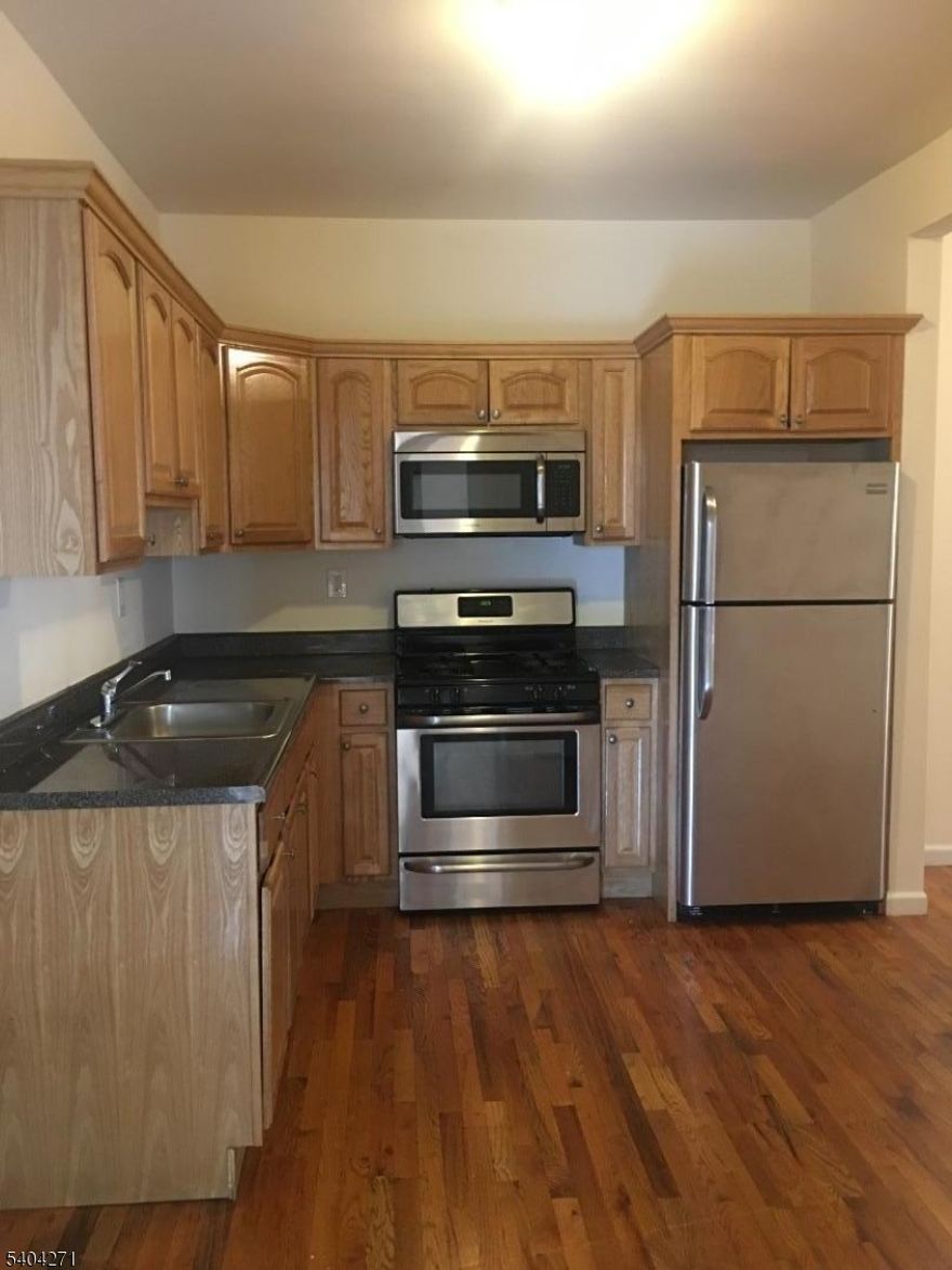 Four Bedrooms, two full baths apartment featuring hardwood floors throughout the apartment.  Stainless steel appliances. Laundry hook-up inside the apartment. Parking available for one car.