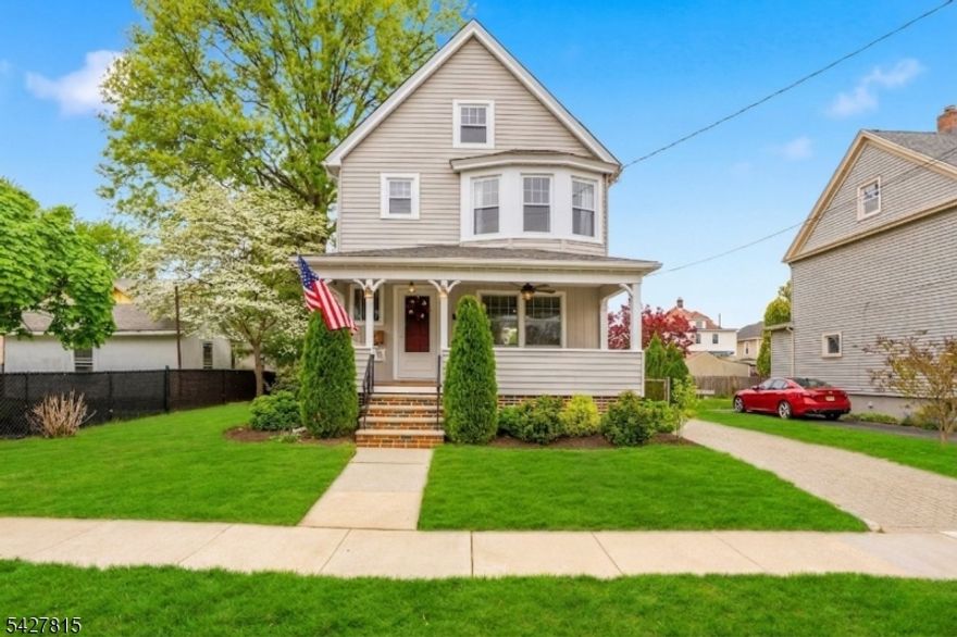 Welcome to this beautiful, charming home in the heart of Garwood, NJ, where warmth, character, and everyday convenience come together effortlessly. From the moment you arrive, the inviting front porch with a classic swing sets the tone perfect for morning coffee or relaxing evenings. Step inside to a sun-filled interior featuring an inviting living room with a cozy gas fireplace, ideal for gathering and unwinding. The spacious formal dining room flows seamlessly into a large, well-appointed kitchen with custom cabinetry & ss appliances offering the perfect setting for both entertaining and everyday living. A convenient first-floor mudroom and powder room add functionality, access to the rear porch overlooking the yard, while abundant natural light fills every corner of the home. Upstairs, you'll find 3 generously sized bedrooms w/ ample closets & a large full bathroom, providing comfortable accommodations for all. The basement expands your living space even further, offering endless possibilities for a recreation area, home gym, laundry, storage & more. Outside, enjoy the benefits of a paver driveway, an oversized detached garage & a well-manicured yard ideal for entertaining, gardening and more. This home truly exudes pride of ownership and is perfectly positioned in an unbeatable location. Enjoy being close to NJ Transit bus service to NYC, the train station, parks, shops, schools, restaurants, gyms, and everyday conveniences making commuting and daily life incredibly easy.