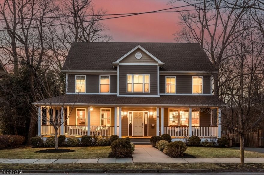 RARE 2013 NEW BUILD on ALMOST 1/2 ACRE! Beautifully built and maintained home in the heart of South Orange, just a 0.5-mile stroll to downtown and train to NYC! Step through the front door from your massive wrap around porch, into a light-filled first floor featuring timeless millwork, modern details, and oversized windows. The gourmet kitchen, with Thermador appliances, extra dishwasher, wine fridge, and massive pantry, flows seamlessly into the open yet distinct living, dining, and family rooms perfect for everyday living and entertaining. On the second floor, four generously sized bedrooms and a luxurious hall bath await. The primary suite offers a peaceful retreat with Juliette balcony, walk-in closet, and spa-like bathroom with soaking tub and spacious shower. The second-floor laundry room adds to the home's convenience. The third floor lives like a private suite, ideal for guests, a home office, or au pair suite, complete with two bedrooms, another full bath, and additional storage space. The large finished basement, with walkout to the backyard and access to the giant two car garage, provides flexible space for a home gym, recreation room, or additional living area, plus another full bath.The incredibly expansive backyard, with large Trex deck, offers plenty of room to relax and entertain. This almost half acre of land gives the next owner the chance to build a pool, a future ADU, or even the possibility of sub-dividing the property.  Don't miss this rare opportunity!