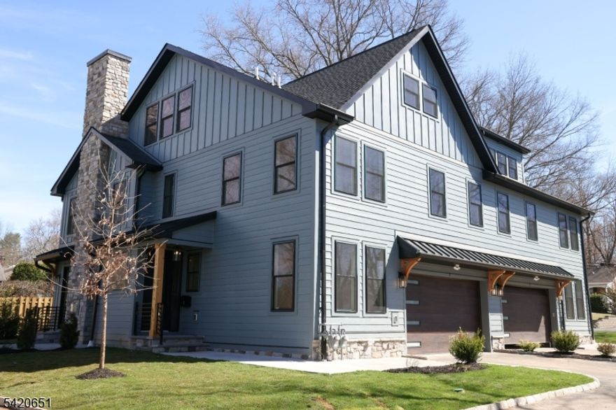 Welcome to Central Villas, a refined end-unit townhome in the heart of New Providence, & a seamless blend of modern design & effortless living. Built by Summit General Construction, this 4-level residence spans approx. 4,450 sq ft, offering 4 bedrooms, 5 full baths, & a versatile 1st-floor office or optional 5th bedroom.Designed for modern living and effortless entertaining, the home features hardwood flooring throughout. The main level showcases a striking living area anchored by a sleek gas fireplace, while the formal dining area opens to a private backyard patio, creating seamless indoor-outdoor flow.The chef's kitchen offers custom cabinetry, a waterfall island, premium Thermador appliances, & a pantry just off the garage entry,a coat closet.The 2nd floor features 3 bedrooms each with a Walk In Closet., & the primary suite offers a tray ceiling & spa-like bath with soaking tub, frameless glass shower, & designer vanities. A full hall bath & laundry complete the level.The top floor offers a sunlit, private suite with soaring ceilings, an en-suite bath, & generous storage, perfect for guests, work, or quiet retreat.The finished lower level adds even more living space, with porcelain tile flooring, decorative wall paneling, a modern electric fireplace, & a full bath ideal for a media lounge, recreation area, or home gym. Additional highlights include a 2-car garage with 12-ft ceilings, EV charger, energy-efficient systems, smart keyless entry, & a 10-year builder warranty.