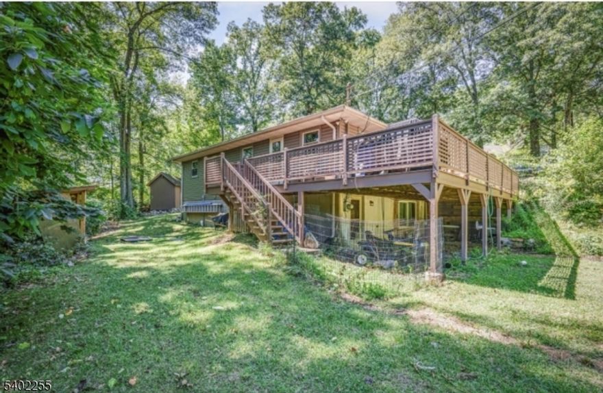 LAKE HOUSE! NESTLED IN NATURE IS THIS FANTASTIC UPDATED 3BD 1BTH CLASSIC RANCH HOME!  FEATURES INCLUDE : UPDATED KITCHEN & BATH, OPEN CONCEPT  FLOOR PLAN, EXPANSIVE DECK, SHED, SPACIOUS CORNER LOT, AMPLE PARKING, HARDWOOD FLOORS, PARTIALLY FINISHED WALK-OUT BASEMENT WITH WOOD BURNING STOVE, LOWER LEVEL PATIO & GENERATOR ROUND OUT THIS GREAT PROPERTY! ENJOY THE LAKE LIFE YOU DESIRE! MINUTES TO: GREAT GORGE SKI AREA, CRYSTAL SPRINGS GOLF, WINERIES, APPALACHIAN TRAIL, HIKING, BIKE PARK, HORSEBACK RIDING, FISHING, PARKS, FARM TO TABLE STANDS, RESTAURANTS, SHOPPING & DOWNTOWN HISTORIC WARWICK! ALL APPLIANCES INCLUDED! LOW TAXES! WOW!