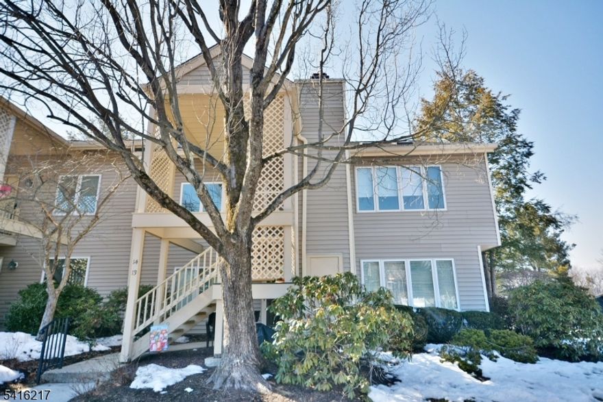 Beautifully Updated Light Filled First Floor End Unit .Open floor plan W/All new flooring Liv. Rm., Din. Rm. & Kitchen W/Stainless Steel Appl., Granite Counter Tops and Breakfast Bar. Large Master Bdrm. W/En suite & Spacious Second Bedroom. W/Full Bath. This Hampton Model is Truly Move In Ready! Access to all Major Highways, Bus & Train.