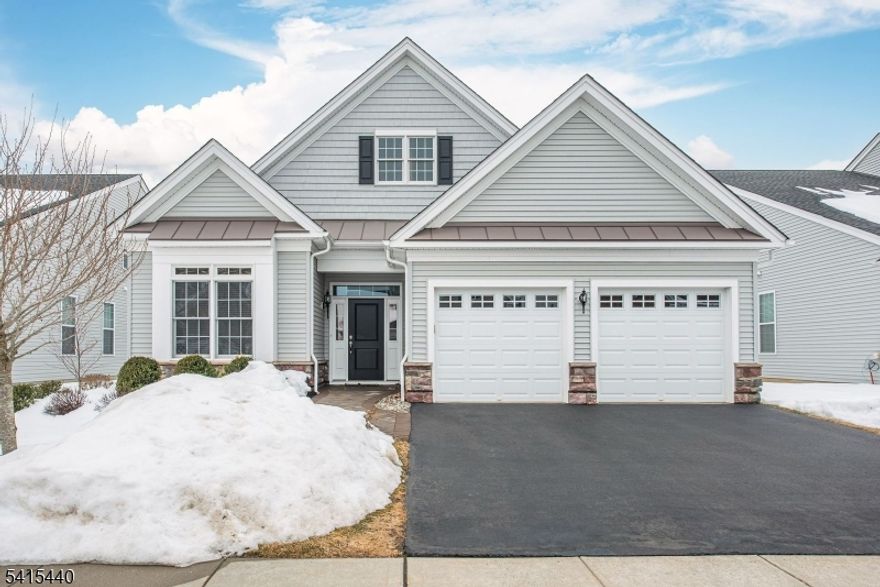 Gorgeous home on a quiet street with a plethora of updates, a sunroom adjacent to an executive patio, fabulous natural daylight, kitchen open to living room and dining rooms, a large den/office, high ceilings, handsome gas fireplace, beautiful flooring throughout and a walk up attic for incredible storage! Enjoy one floor living, a clubhouse, pool and all that Regency at Flanders has to offer! Near highways, shopping and dining too.