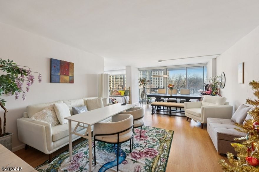 Luxury Living Awaits!  Discover this beautiful 1-bedroom, 1.5 bath condo offering stunning scenic views and effortless elegance. Step inside to a bright, open-concept layout featuring a spacious living and dining area perfect for both relaxing and entertaining. The stylish galley kitchen is appointed with stainless steel appliances.  Enjoy your morning coffee or unwind in the evening on your private balcony while taking in the picturesque views. The generous primary bedroom features a walk-in closet for ample storage.   Resort-style amenities include a 24-hour doorman with available valet service, a pool with sundeck, BBQ area, tennis & pickleball courts, and fitness center.   Ideally located just minutes from downtown Montclair, this community offers easy access to shopping, dining, major highways, and public transportation.  All utilities and amenities are included in the monthly maintenance fee. Don't miss the opportunity to enjoy luxurious living in one of the area's most sought-after communities!