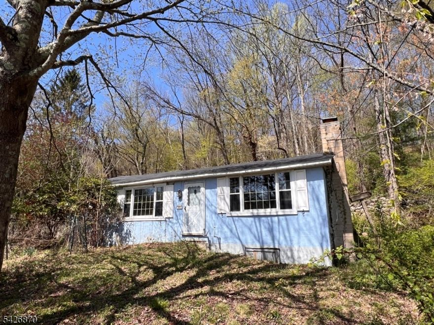Amazing Location! Bring your imagination and make this home your own! This ranch home features large eat-in kitchen, dining room, living room w fire place, 3 bedrooms, full bath, laundry and so much more! Sold in As-is condition.