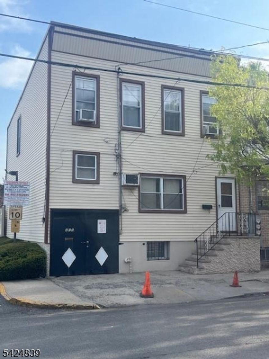 Newark Ironbound, location, location, several blocks from Newark Penn Station, near grocery and retail stores, restaurants, coffee shops, about 10 minutes driving to Newark Airport etc. This 2 Family home offers, first and second floors 2 bedrooms, kitchen, living room and full bathroom, finished basement, driveway under the house to access a garage in the rear, house sold as is condition.