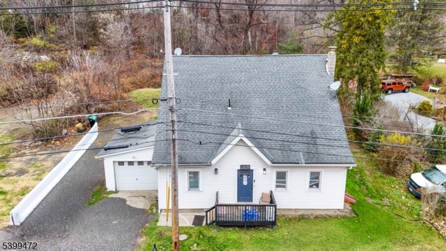 Welcome to this inviting 3 bedroom, 2 bath home offering 1,632 sq ft across three levels of living space. The main floor features a spacious kitchen, a bright dining room, and a comfortable living room. An enclosed porch adds a great bonus area for relaxing, storage, or seasonal use. The multi-level layout provides flexibility for bedrooms, office space, or a rec area. Conveniently located on Route 565, close to parks, shopping, and all that Vernon has to offer. (New septic installed in 2020)