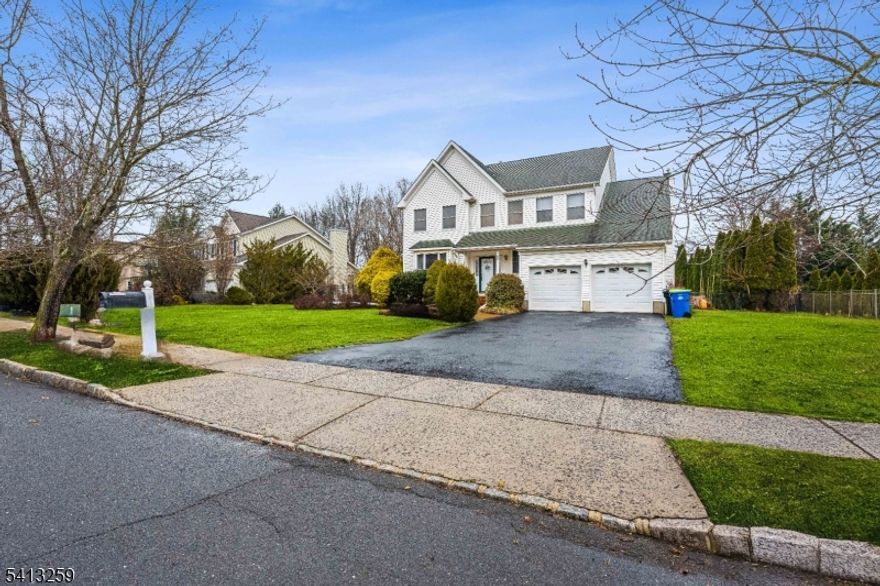 Spacious Colonial nestled in a quiet neighborhood, offering both space and convenience.  The large eat-in kitchen is ideal for entertaining and open to the cozy family room featuring a gas fireplace for relaxing evenings at home.  A private first floor home office provides the perfect work-from-home setup.  The primary suite boasts dual walk-in closets and beautiful hardwood floors flow throughout the entire home.  The fully finished basement offers versatile additional living space, complete with a wet bar, sink and ample storage.  Step outside to a spacious deck overlooking a generously sized backyard, perfect for entertaining, relaxing and outdoor enjoyment.  Easy access to NYC via direct bus service w free parking. Located between two major Universities Rutgers & Princeton. Top-rated medical facilities, professional theaters and several top rated restaurants. Surrounded by many parks and trails; such as, Colonial Park, D&R Canal, Duke Island Park.