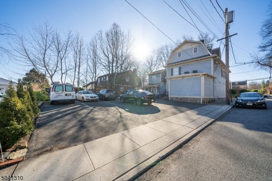 Spacious & easy to show three bedroom, one bathroom apartment, washer/dryer in unit, dishwasher, refrigerator and microwave. This unit also comes with TWO assigned outdoor parking spots in a shared driveway. Plenty of light and completely refreshed featuring hard wood floors and central air.