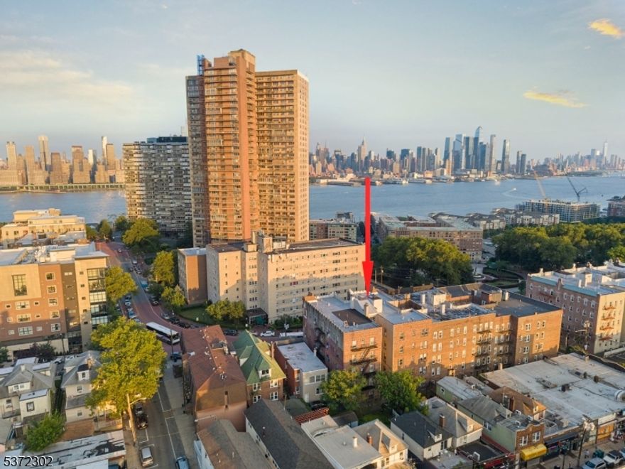 Located in the Camelot Condominiums, this beautifully updated first-floor condo offers comfort, convenience, and modern style. The one-bedroom unit features an open-concept living room and kitchen perfect for entertaining. The brand-new kitchen is equipped with beautiful cabinets, granite countertops and stainless steel appliances, while the renovated bathroom boasts a sleek stand-up shower. Hardwood floors throughout and large closets. Enjoy added convenience with on-site storage and laundry facilities, plus HOA fees that include water and heat. Just steps from NJ Transit buses into NYC, NY Waterway Ferry and Donnelly Memorial Park, where you'll enjoy scenic views of Midtown Manhattan. Stylish, move-in-ready, and in an unbeatable location!