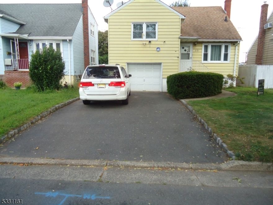 Welcome to this beautifully maintained 3-bedroom, 2-bath split-level home nestled on a generous 40x100 lot in a desirable neighborhood. This charming residence offers an inviting layout featuring a bright, spacious eat-in kitchen and a warm, welcoming living room with gleaming hardwood floors. Enjoy seamless access to the meticulously landscaped backyard, perfect for relaxing or entertaining.Hardwood flooring flows throughout all three levels, enhancing the home's timeless appeal. The second floor offers two comfortable bedrooms and a full main bath, while the upper level boasts an extra-large third bedroom with abundant storage.The lower level features a full basement complete with a laundry area, half bath, utility room, and direct access to the attached garage. This home is equipped with a new dual-function energy-efficient central AC and heating system for year-round comfort.Additional highlights include a large paved driveway accommodating up to four cars, a spacious backyard with lush grass and vibrant plantings, and proximity to train stations, parks, shopping centers, restaurants, and major highways making commuting and daily living a breeze.This property perfectly blends comfort, functionality, and location, offering an ideal opportunity for today's homebuyers.