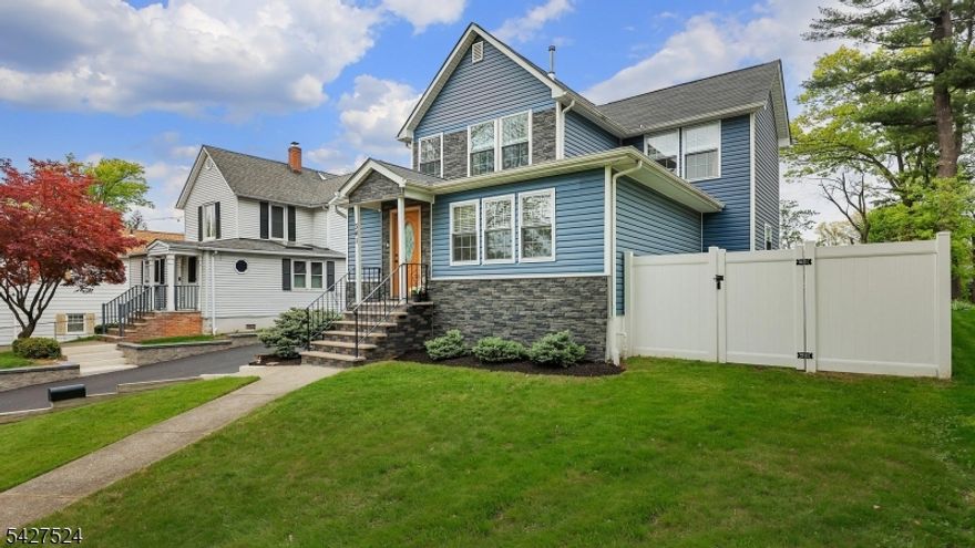 Welcome to this stunning, turn-key colonial set on an expansive property in Fanwood. Upon entering, you are greeted by gleaming hardwood floors and an abundance of natural light streaming through oversized windows. The first floor offers an exceptionally spacious and versatile layout, highlighted by a beautifully appointed chef's kitchen featuring custom cabinetry, a generous center island, granite countertops, & premium stainless steel appliances.  Two additional bedrooms on this level are currently being utilized as a dining room and family room, offering flexibility to suit a variety of lifestyles. A full bath completes the first floor, along with seamless access to a beautiful deck overlooking the professionally landscaped, expansive property. Upstairs, the serene primary suite is a true retreat, filled with natural light and featuring two oversized walk-in closets and a luxurious full bath. Two additional generously sized bedrooms share a well-appointed hall bath, offering both comfort and functionality. The finished basement provides valuable additional recreation space, ideal for a home gym, media room, or play area, further enhancing the home's versatility. Set on an impressive 200-foot-deep lot, the outdoor space offers exceptional privacy and endless possibilities for entertaining & relaxation. Thoughtfully designed, meticulously maintained and ideally situated within the highly sought-after Scotch Plains school district!