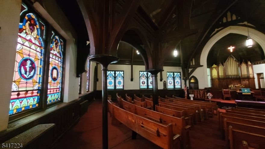 RELIGIOUS FACILITY WITH AN ADJACENT DETACHED HOUSE AND PARKING LOTS ON ONE 0.40 ACRES ACROSS FIVE PARCELS RELIGIOUS FACILITY (12,020 SF) The main level consists of a sanctuary, front lobby, a conference room, classroom with stage, small office and bathroom. The lower level is partially finishedand consists of a fellowship room, choir room, storage room, kitchen, boiler room and bathroom. HOUSE (2,965 SF) The house consists of a first floor with four rooms and two bathrooms, a second floor with two larger rooms, a smaller room, kitchen and full bath; and a third floor with two bedrooms and a bathroom. The full basement is unfinished. PARKING LOTS The offering contains 3 parking lot parcels, two contiguous and one separate on the corner of Springs Street and Weiss Street. Parcel ID's: 08 05807-0000-00018 08 05807-0000- 00017, 08 05805-0000-00001, 08 05805- 0000-00003, 08 05805-0000-00004. Religious building is 14,985 SqFt. Parking 30 Paved Spaces, Street. Please request the additional photos before scheduling showing.