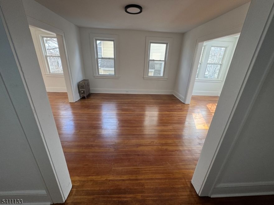 Welcome to this exceptionally spacious, fully renovated 2-bedroom, 1-bath apartment, first floor apartment near downtown West Orange, just minutes from Montclair. Ideally located near Main Street, schools, shopping, and nearby houses of worship, this home offers both convenience and comfort. The beautifully updated interior features modern finishes throughout, a thoughtfully designed layout with generous room sizes, and the rare bonus of in-unit laundry. Enjoy the ease of one dedicated off-street parking space and the lifestyle that comes with being close to everything while still having room to spread out.