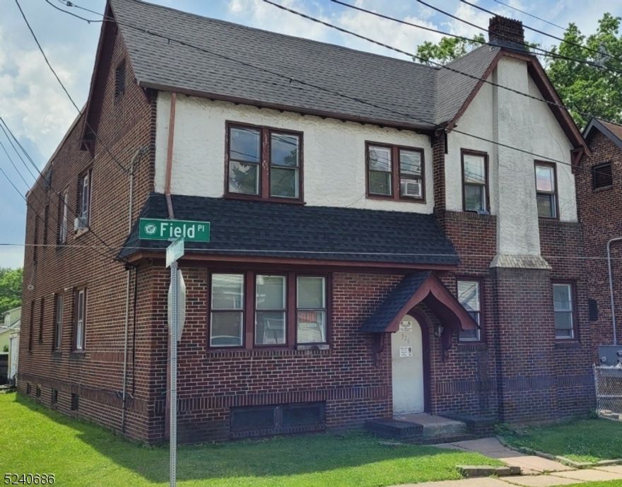 Conveniently located near bustling transit hubs, major highways, and vibrant shopping centers, this residence offers the perfect blend of accessibility and comfort. Step into a space that has been thoughtfully modernized with gleaming hardwood floors throughout, exuding both warmth and sophistication.  Discover the epitome of urban living in this charming, sun-soaked three-bedroom apartment nestled within a quaint four-unit brick building.  The newly renovated bathroom boasts stylish decor, providing a serene oasis for relaxation and rejuvenation. The kitchen, adorned with updated appliances and cabinetry, provides space to eat in. Two of the bedrooms are uniquely designed in a classic railroad style, offering versatility in layout and use. Embrace the charm of the past while enjoying the convenience of modern updates. While street parking adds a touch of suburban tranquility, the proximity to transit options ensures seamless connectivity to city adventures. This newly updated apartment presents an unparalleled opportunity to experience urban living at its finest. With its prime location, elegant finishes, and a blend of historic allure and contemporary convenience, this space invites you to create lasting memories and embrace a lifestyle of comfort and accessibility.