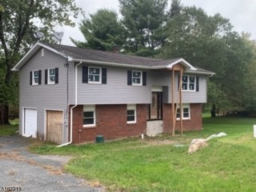 Calling all investors! This home is ready and prepped to be brought back to life. Located on a quiet street and only minutes from Rt. 80. So much potential! Fully gutted on the inside, studs only. New siding, septic system, and windows all 2020. As-is where-is. Cash/reno loans only. All C/Os and water testing are the responsibility of the buyer. Well is not currently hooked up to electric or plumbing. Under ground Oil tank was removed and seller is taking on the responsibility for the soil remediation that is required. There is an above ground oil tank on the first level. Cabinets in garage included in sale.