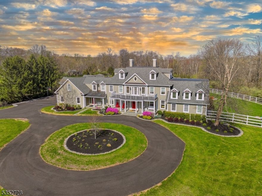 Set on nearly 8 private acres in Delaware Township, this 2021 custom-built estate offers a rare blend of privacy, luxury, and effortless access to the lifestyle destinations of Lambertville, New Hope, and Stockton. Designed as a true year-round retreat, the home is ideal for both refined everyday living and unforgettable entertaining. Soaring ceilings, a chef?s kitchen, and a 1st Floor primary suite anchor the main level, while multiple guest suites and flexible living spaces span three finished levels. The lower level is designed for relaxation, wellness and hosting at scale. Outdoors, a resort-style setting awaits with expansive stone patios, firepit, gardens, and a stunning in-ground pool with spa and pool house ? creating a private escape that rivals a boutique resort. Enjoy nearby hiking, preserved open space, and Blue Ribbon schools. Peaceful and secluded, yet just minutes from dining, culture, and charm ? this is refined country living at its best.