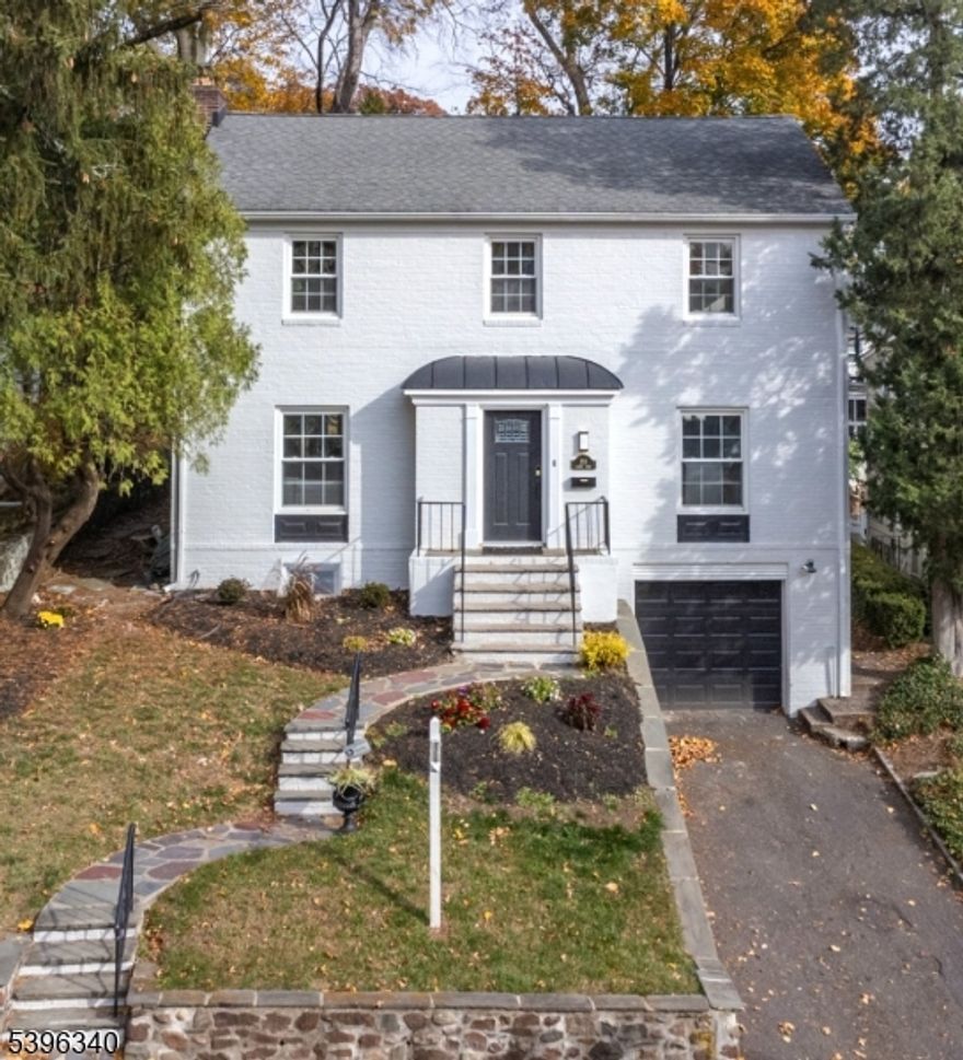 Beautiful center hall colonial in South Orange Village. Train station and Village just steps away. Home has many updates throughout.. 3 large bdrms, 2.5 baths.The flow of the home is perfect for entertaining. Separate eating area aside beautiful white kitchen with quartz countertops and stainless steel appliances. Gleaming harwood floors, updated baths, walkin shower in ensuite, oversized primary bedroom. Neutral tones throughout the home gleam with the over abundance of natural sunlight. Enjoy the perfect location of this home, as it sits in the heart of South Orange Village.