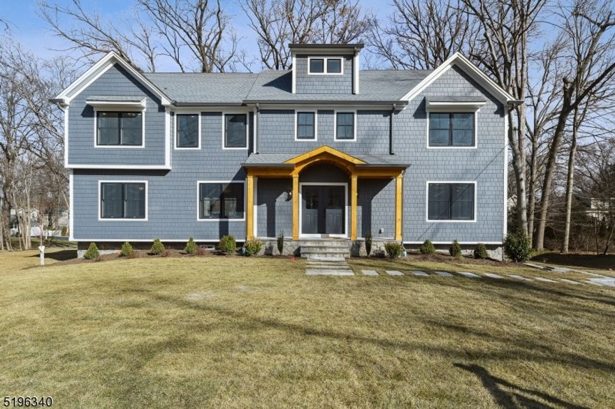 Brand new dream home!! Premier designer and builder, JTS, brings another incredible home to market on a highly sought-after street. A wide, level lot with mature trees is the perfect setting for this 6 BR, 5 Full Bath, 2 Half Bath home. Warm, upscale finishes- custom millwork, white oak flooring, designer light fixtures, are only a few of the special touches that make this new build feel like a high-end custom home. Large open-concept first floor layout with first floor en-suite bedroom, dedicated office, walk-in pantry and 9' ceilings. Second floor is home to a beautiful laundry room and 5 large BRs (includes primary suite) all with unique millwork and custom closets. An enviable primary suite boasts spa-like bath with heated floor, vaulted ceiling with oak beams and shiplap. Finished 3rd floor has a closet and is open for a bedroom or whatever someone wants to create. Walk out basement with half bath, custom mudroom and large recreation area. Some of the most impressive features of amazing home don't necessarily stand out to the naked eye ... Spray foam insulation, full house generator, Hardie composite shake and plank, Thermador appliance package, humidifiers on HVAC units, wired for sound, bluetooth speakers in 2nd fl bathrooms, multi-zone sprinkler system, Belgium block lined driveway, composite decking