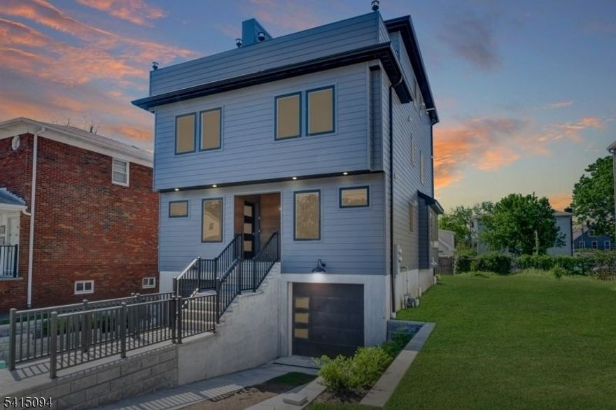 Welcome to this beautifully maintained townhome in Millburn's sought-after Downtown Washington neighborhood, offering the perfect blend of city style and suburban convenience. Just steps from downtown shops, restaurants, top-rated schools, Taylor Park, and the Midtown Direct train to NYC, this 3-bedroom, 4.1-bath home is ideal for modern living. Enjoy hardwood floors, oversized windows, and elegant finishes throughout. The main level features a gourmet eat-in kitchen with a center island, high-end appliances, a bright family room with access to a deck and private yard, plus a convenient powder room. Upstairs includes a spacious primary suite and an additional en-suite bedroom. The top floor offers another en-suite bedroom, laundry room, and access to a private rooftop terrace. The finished lower level includes a flexible recreation room and full bath perfect for guests or a home office. Don't miss this rare rental opportunity in the heart of Millburn!