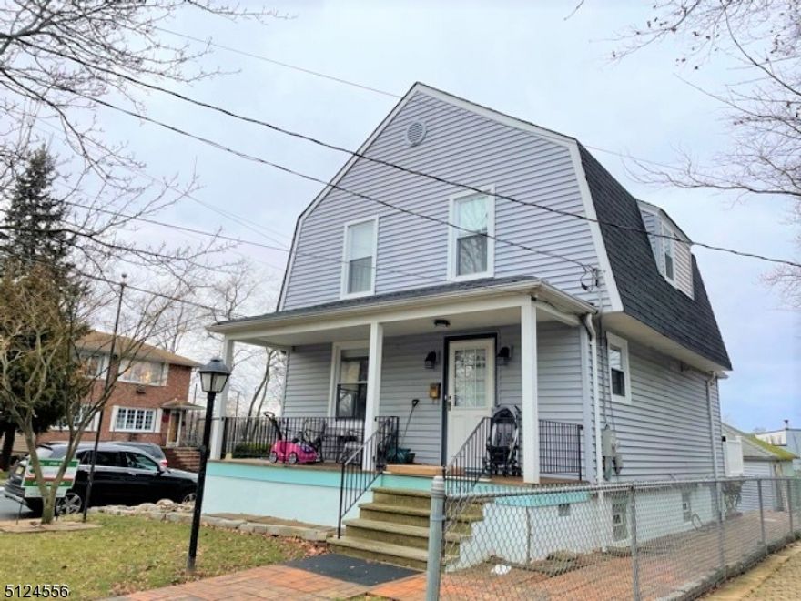 Renovated 3 bedrooms,  2 full baths , 2 -story single family.  Front porch /the home's front entry. White cabinet, all granite surfaces, stainless steel appliances including a natural gas range/ oven vented out. Modern composite flooring stretches throughout the home's 1st level.  Just off the kitchen a rear landing to the grounds & an oversized detached garage. Access to a dry, unfinished basement. 3 bedrooms on 2nd floor, hard wood floors& a full bath with a double vanity& shower over a tub. Photos from previous listing