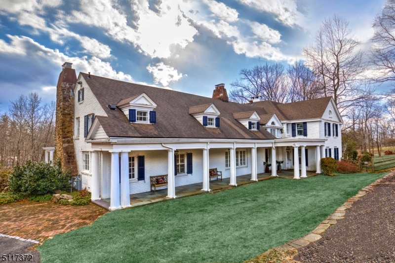 For Comp Purposes Only. FAIRFIELD part of the Stronghold Estate, built in the Colonial Revival style. George B. Post & Josiah R. Brierly, noted architects, designed the house in its present configuration. Renovations 2015. New kitchen, bathrooms, pool, lighted tennis court (2015-2020). John Rowlett Brinley planned  its 10 acres. Gracious rooms, some with fireplaces & fine architectural details highlight this exceptional Bernardsville Mountain Colony Estate.  Among the outstanding rooms are the Billard Room with imported paneling,  banquet-sized Dining Room, Designer Kitchen w/Center Island & FP, Library, Garden Room, Office & Family Room overlooking the grounds. Additionally 5 Bedrooms, Service Quarters, Bar & Game Rooms & Home Theater. Greenhouse, Gazebo, handsome Barn: 4 stalls & guest quarters attached. Farm assessed: low taxes