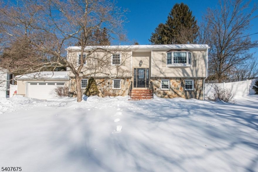 Welcome to this expansive 4-bedroom, 2-bath Bi-Level home perfectly situated on a lush half-acre lot. Inside, the upper level features an open layout that flows seamlessly into the heart of the home. The lower level offers a fourth bedroom, also perfect for a media room or home office, including a large recreation room with a cozy wood burning stove. Step outside to your own backyard paradise, featuring a sparkling in-ground pool and expansive green space for summer BBQs. Located in a quiet, sought-after neighborhood, this home offers the perfect blend of relaxation and recreation.
