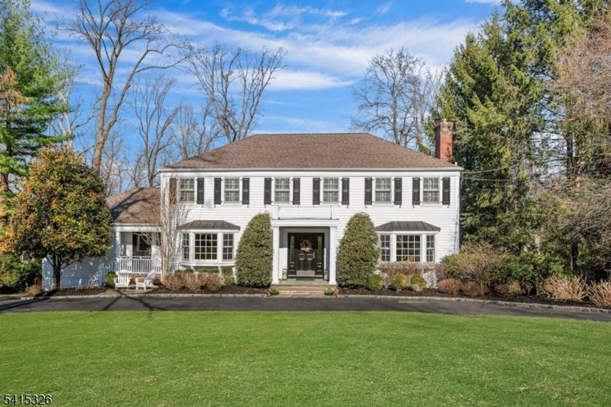 Welcome home to this beautifully appointed Colonial ideally located in one of Chatham's most sought-after neighborhoods! The gracious front-to-back living room with fireplace and the formal dining room sets the tone for sophisticated entertaining.The true heart of the home is the stunning kitchen featuring custom white cabinetry, white Carrera marble countertops, Wolf 6 burner cooktop and double ovens and Sub-Zero fridge. A large center island with seating provides the perfect space for casual gathering.The kitchen flows effortlessly into the inviting family room, highlighted by a wall of windows, gas fireplace, and custom built-ins, creating an ideal setting for everyday living and entertaining.Nearby is the laundry/mudroom. A bonus is the handsome first-floor office, complete w/ custom cabinetry, 2 work stations and access to the deck overlooking the lush backyard.The 2nd floor is home to a serene primary suite ,with walk in closet and spacious ensuite bath w/ double vanity and frameless glass shower. 3 additional generously sized bedrooms and a spacious hall bath complete this level.The fabulous lower level is designed for added enjoyment! Custom wet bar w/refrigerated drawers, ice maker and custom built-ins in the seating area. French doors to patio with dining/seating areas are surrounded by blooming gardens.Expansive rear lawn has been host to a skating rink, batting cage and lacrosse nets! This beautiful home is the perfect place for creating your own lasting memories!