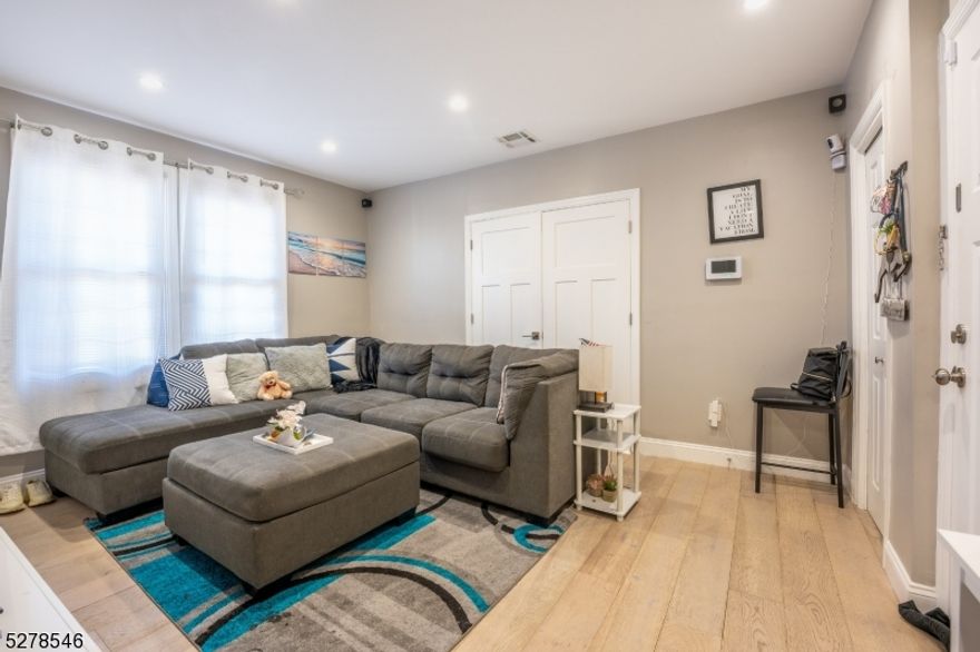 Great investment opportunity! Updated to perfection in 2017, sitting on a 6500 SF double lot, this two- family awaits new owner! The first floor features a large living room, bright and airy dining room, full renovated kitchen with espresso shaker cabinets, quarts counter tops and SS appliances, all included in sale, a great size bedroom and full bath. Second floor with 2 great size bedrooms, including master with walk in closet, full renovated bath with wireless Bluetooth speakers connected to the night lighting system and mosaic and porcelain tiles, living room and eat in kitchen. Partially finished basement with full bath, and two additional rooms with endless possibilities! Full unfinished attic for possible additional living space or storage. This home is the most energy efficient home you can ever imagine, featuring recessed lighting, tankless water heaters, newer HVAC systems and newer electric (200-amps service), and newer roof. This gorgeous home also has newer windows, and much more! Every detail was carefully selected and quality crafted. Fabulous location, only a mile away from the train station, close to bus stops, shops and major highways. Currently Fully rented, tenants are month to month.  A Must See!