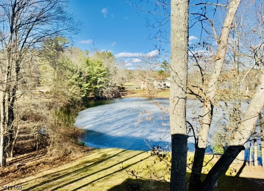 UPDATED WATERFRONT CONDO!  FEATURING: A SPACIOUS OPEN & AIRY FLOOR-PLAN, NEW NEUTRAL CARPETING & FRESHLY PAINTED NEUTRAL INTERIOR, 2 LARGE BEDROOMS & 1 BATH WITH DOUBLE SINKS, NEARLY 1000 SQ FT, LARGE COVERED DECK OVERLOOKING THE WATER, ALL APPLIANCES INCLUDED & PLENTIFUL PARKING ROUND OUT THIS WELL PRICED UNIT! LOW TAXES & LOW HOA!!!