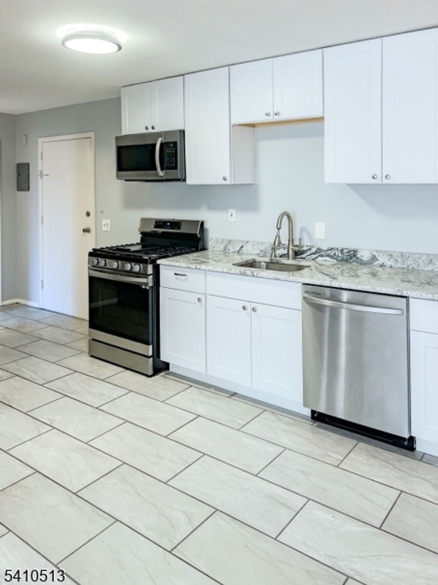 Newly renovated offers an open floor plan, beautiful hardwood and ceramic flooring, Kitchen with granite counters, white cabinets and stainless appliances, spacious updated bathroom. Private storage area and laundry area, assigned parking space. Low monthly fee includes heat, water and sewer, snow removal and ground maintenance. Great home owner building very well cared for inside and out. New roof, parking lot, water heaters and Boilers Updated laundry room. Ready for occupancy!!!