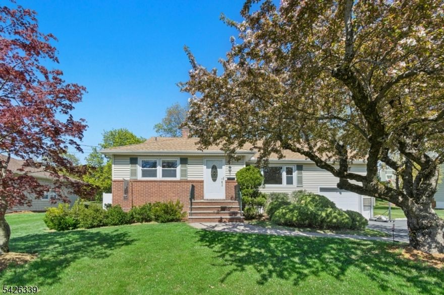 This home offers a spacious floor plan designed to accommodate a variety of lifestyles. You're welcomed by a vaulted ceiling in the living room, creating an open and airy feel from the moment you walk in. The surprisingly large family room is perfect for gatherings and flows seamlessly to the outside patio, the ideal spot to spend all summer long. With 4 bedrooms there's flexibility to suit your needs, including 1 now used as a guest room and home office. The primary bedroom features a walk in closet you won't want to miss, offering both space and functionality. Set on a generous 10,000+ sq ft lot, the backyard is fully fenced with low maintenance vinyl fencing. A paver patio creates the perfect setting for barbecuing and al fresco dining, making outdoor entertaining a pleasure. The College Estates area of Cranford is one of the town's most popular neighborhoods known for its proximity to Brookside School and just a few blocks away from Nomahegan Park with year round activities, jogging & bike paths. Dreyer Farms is 2 blocks away offering freshly picked fruits & veggies, baked goods, flowers, plants and a variety of nursery items. Downtown Cranford is is close by, an enjoyable stroll on a nice day where you will enjoy a multitude of dining venues, boutiques, fitness facilities, movie theater and NYC transportation