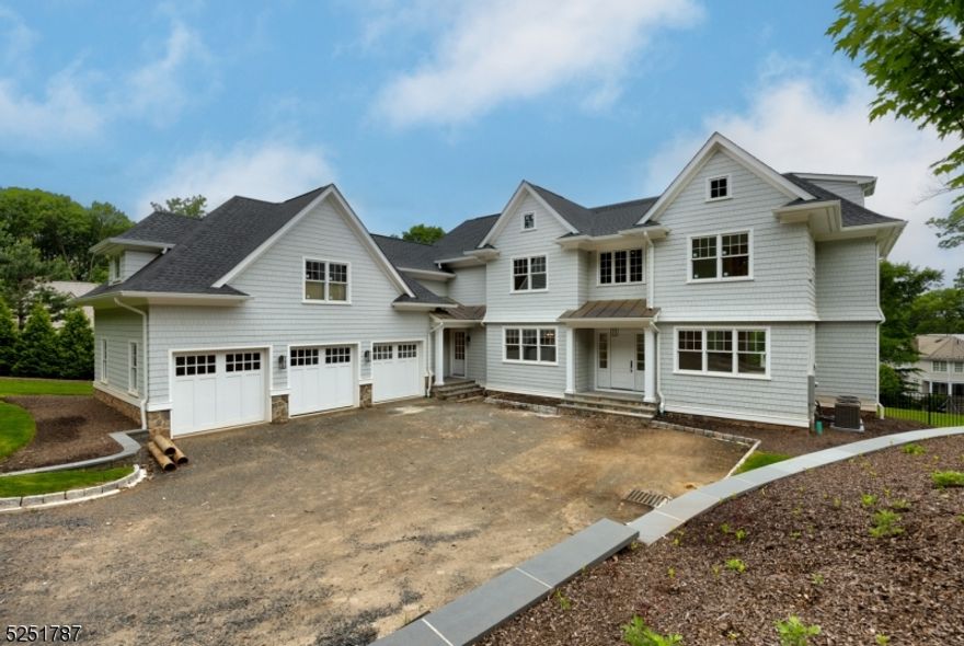 Luxurious NEW custom home on Short Hills sought after Hartshorn Drive w/ an open & airy flexible floor plan, high ceilings, top-of-the-line finishes, & outstanding attention to detail. Over 6,000 sq ft of finished living space, w/ opportunity for over 8,600 sq ft of living space w/ upgrades. 1st lvl highlights include 10-foot ceilings, elegant Living & Dining Rooms, Family Room w/ coffered ceiling & fireplace open to stunning Gourmet Chef's Kitchen w/ crisp white custom cabinets, large center island, & Wolf/Sub-Zero appliances, Butler's Pantry, HUGE Mudroom w/ custom cabinetry, separate entrance, & 2 Closets, 1st Lvl Office/Guest Bedroom Suite. Exquisite 2nd lvl w/ Primary Bedroom Suite w/ 2 Walk In Closets & bath rivaling a 4 Seasons Resort. 3 other sun-drenched 2nd lvl bedrooms (all ensuite) w/ fantastic closets. 2nd Lvl Laundry for 2 washers and dryers. 2nd Lvl Bonus room w/ vaulted ceiling can be upgraded to another Bedroom, Office, or Yoga Room you choose! ENORMOUS, fully customizable 3rd Lvl w/ the potential for 2 Bedrooms. Gorgeous fenced rear property on a scenic ridge with Deck & divine covered Patio. Massive walk-out Lower Lvl provides endless hours of entertainment w/ Recreation Room (w/ multiple zones for TV watching, game room, play), Full Bath, unfinished room that can be customized as Exercise Room &/or Wine Cellar, & potential to enclose area to create an additional bedroom. "Smart home w/ fully wired Savant Smart Home System. This home is the whole package!