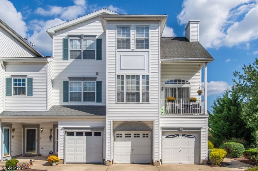 Welcome home to this pristine 3 bed 2.1 bath end unit.  This home boast an open floor plan and updated engineered floors.  Living room features a two story vaulted ceiling that fills the room with sunlight.  Off the living room is the covered deck, perfect for enjoying your morning coffee. The spacious kitchen has granite counter tops and a generous pantry. The third floor includes a convenient laundry room. The light filled primary bedroom has a cathedral ceiling, walk in closet  and generous bathroom with soaking tub. The other two bedrooms feature spacious closets as well. Located moments away from train, mass transit, major highways and all that downtown Morristown has to offer.